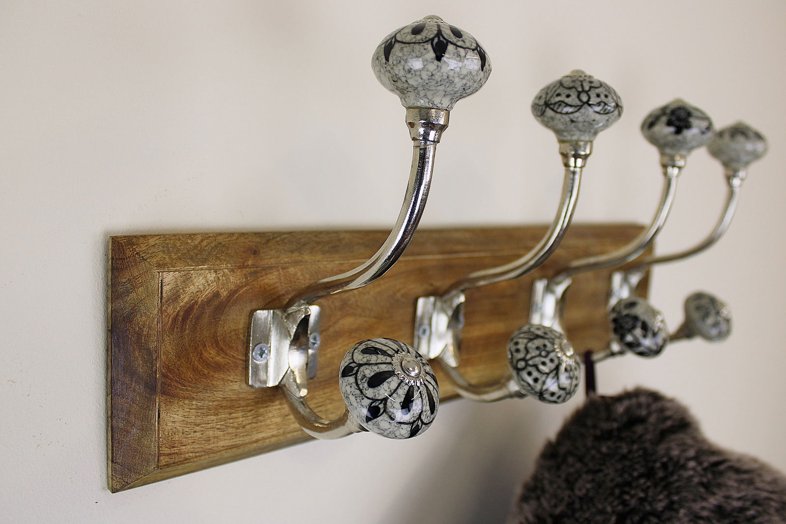 black-grey-ceramic-hooks-on-wooden-baseat Willow and Wine!