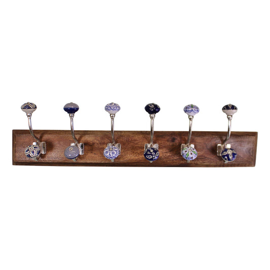 6-double-ceramic-blue-white-coat-hooks-on-wooden-baseat Willow and Wine!