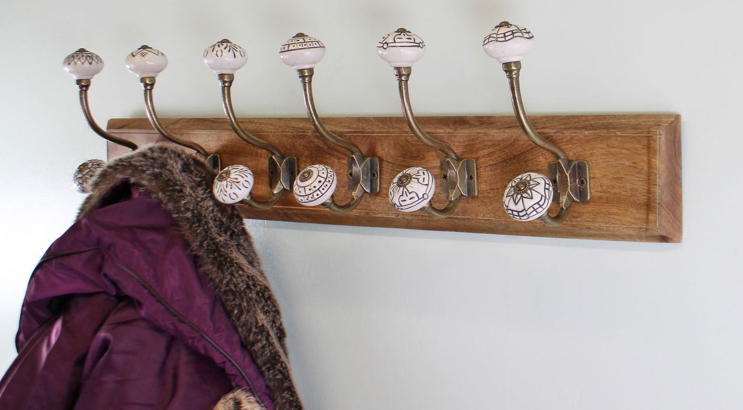 6-double-ceramic-ivory-coat-hooks-on-wooden-baseat Willow and Wine!