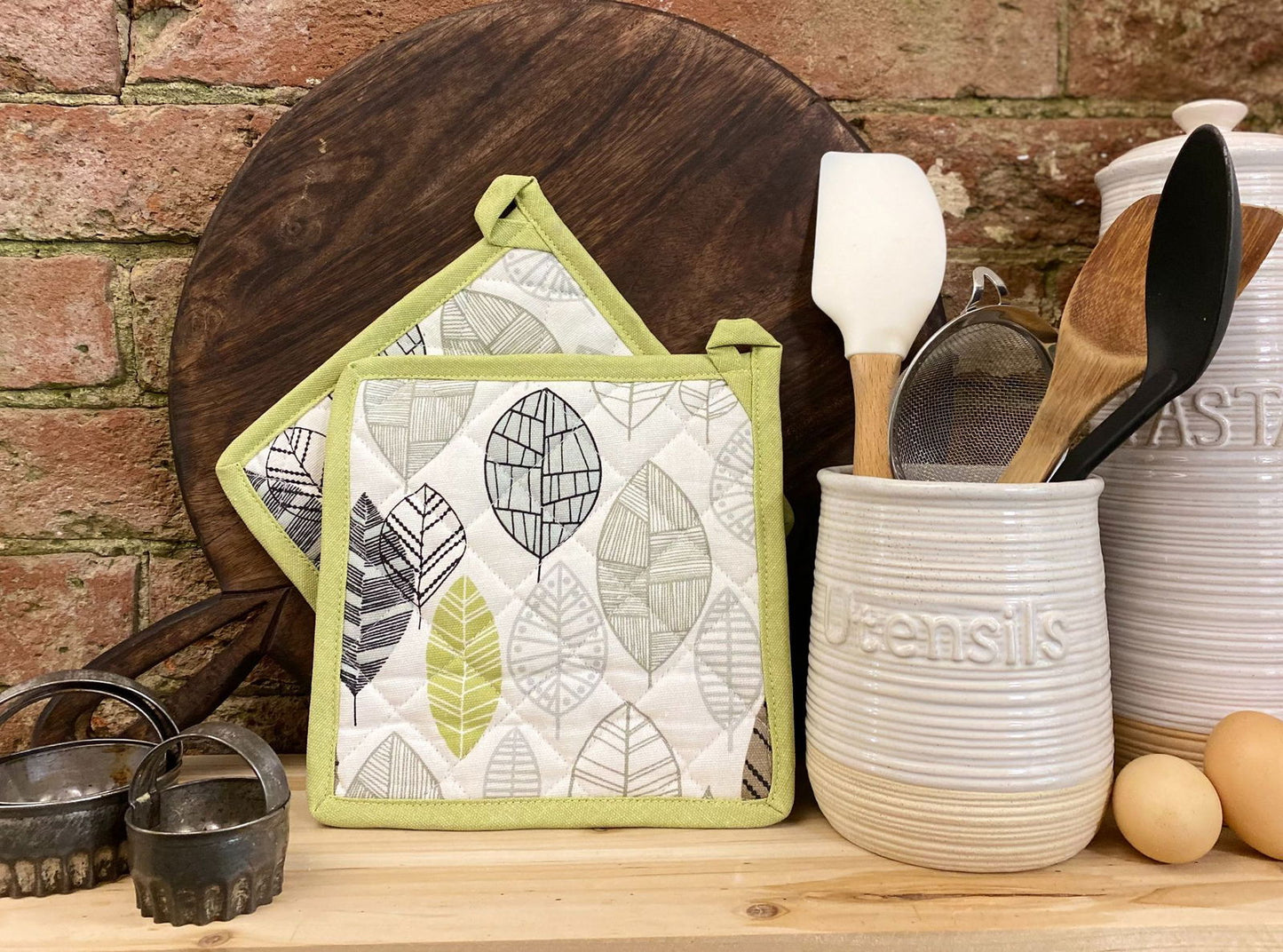 two-fabric-pot-or-pan-mats-with-contemporary-green-leaf-print-designat Willow and Wine!