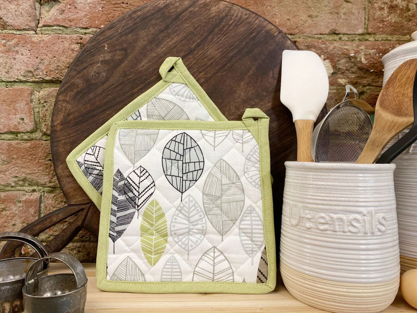 two-fabric-pot-or-pan-mats-with-contemporary-green-leaf-print-designat Willow and Wine!