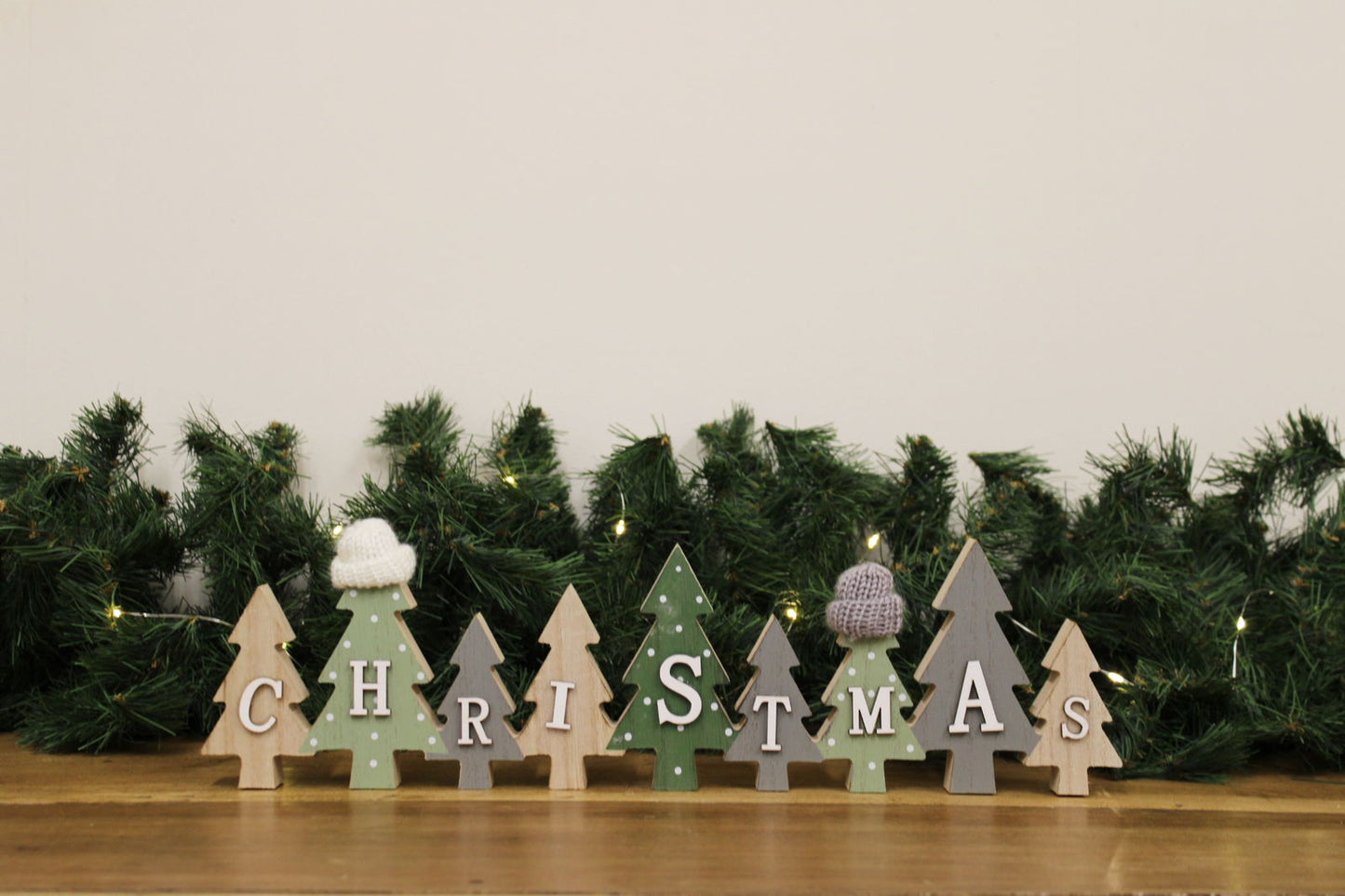 row-of-christmas-trees-decoration-with-hats-greenat Willow and Wine!