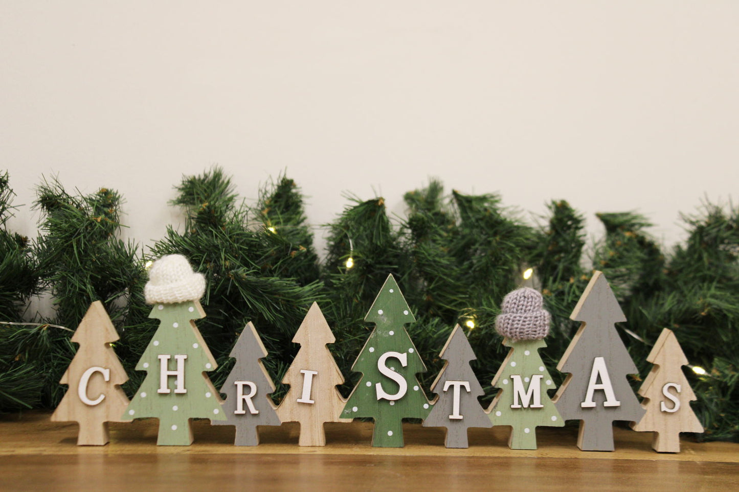 row-of-christmas-trees-decoration-with-hats-greenat Willow and Wine!